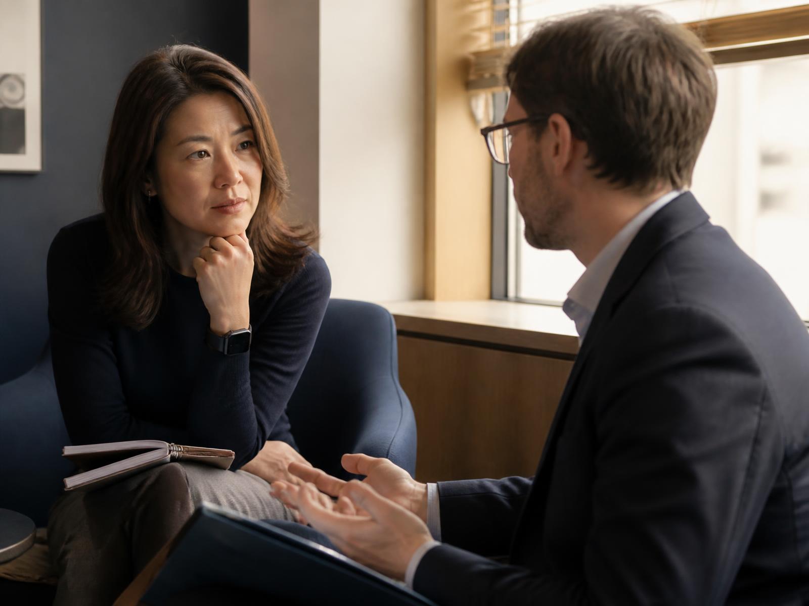 An employee speaking privately with a neutral Conflict Line professional